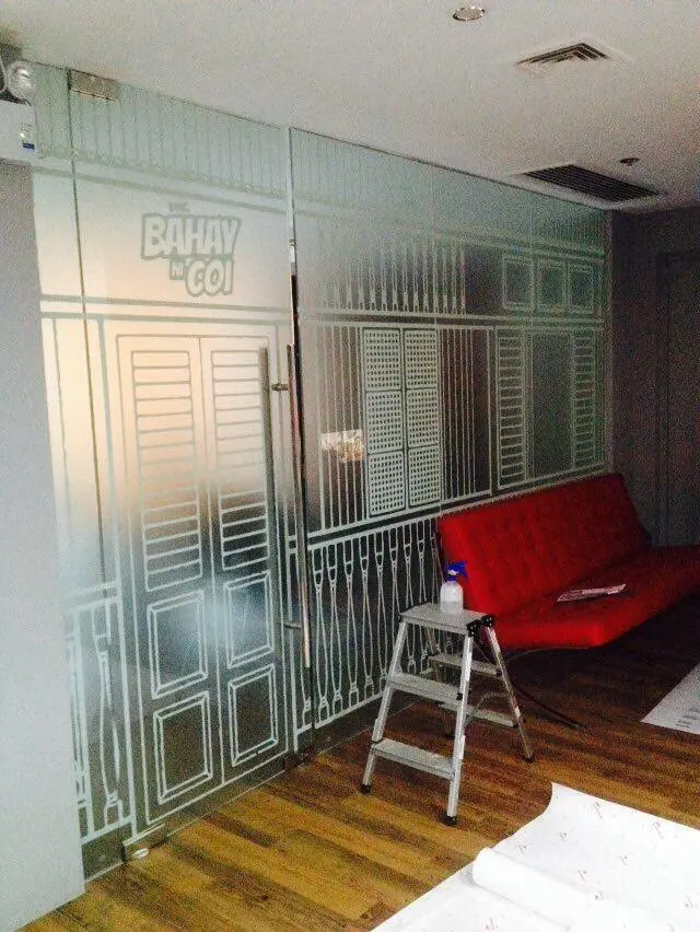 Illustrated frosted decal on a glass wall