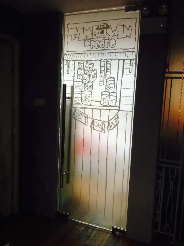 Illustrated frosted decal on a glass door