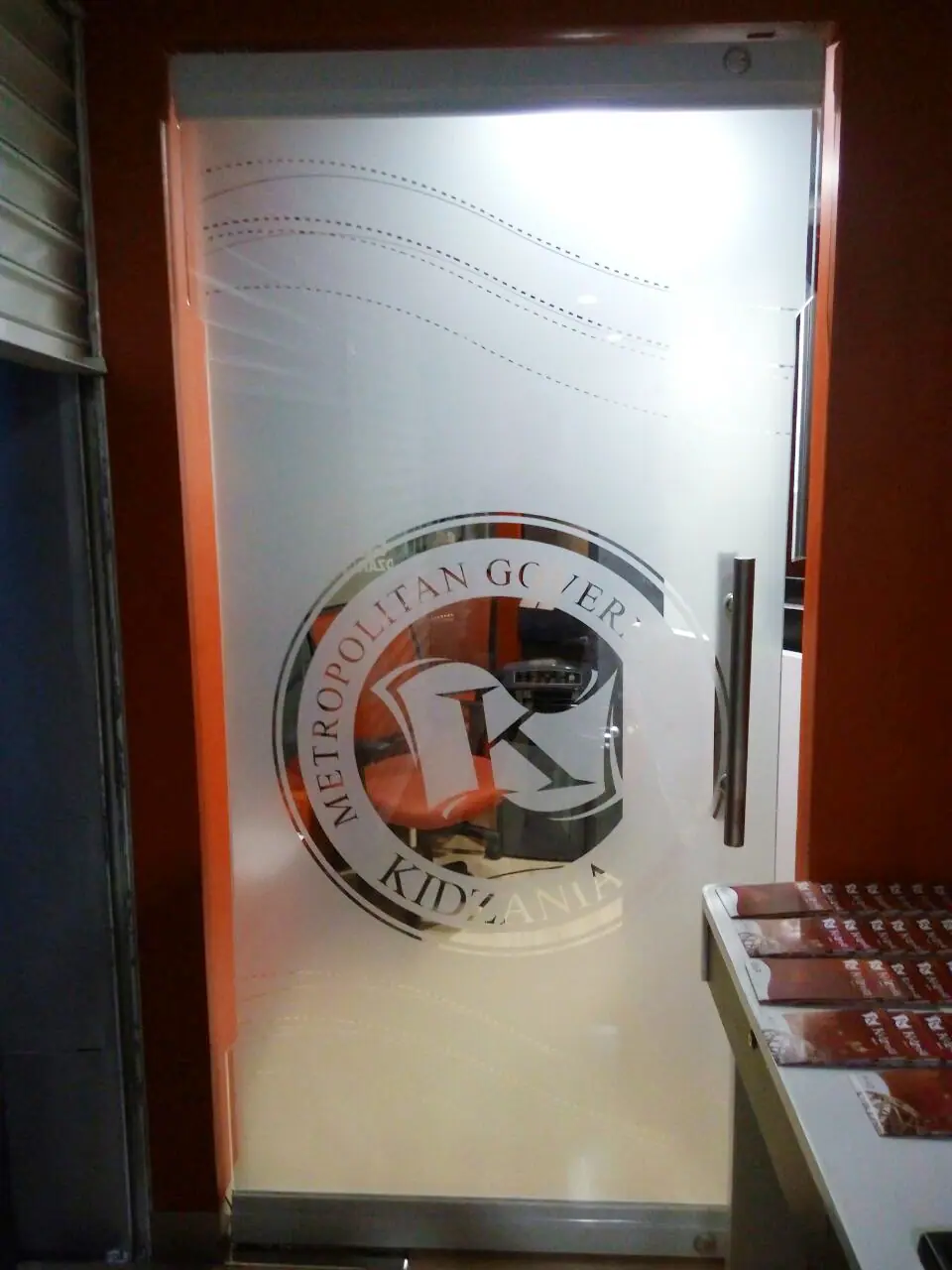 Frosted logo decal on a glass door