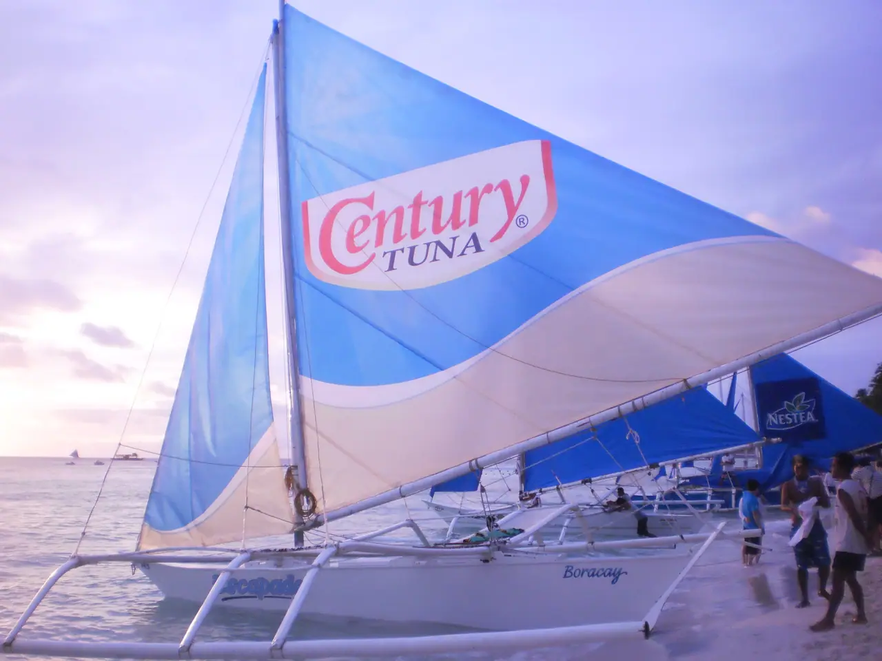 Printed sail on a paraw at dusk