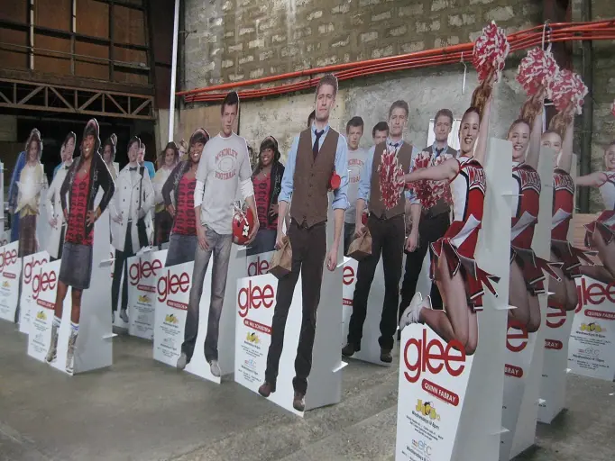 Life-size standees lined up before delivery