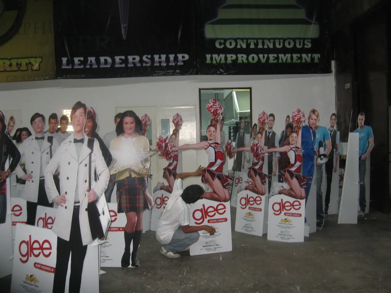 Life-size standees being assembled