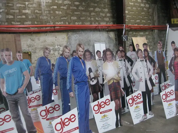Life-size standees with printed base signs