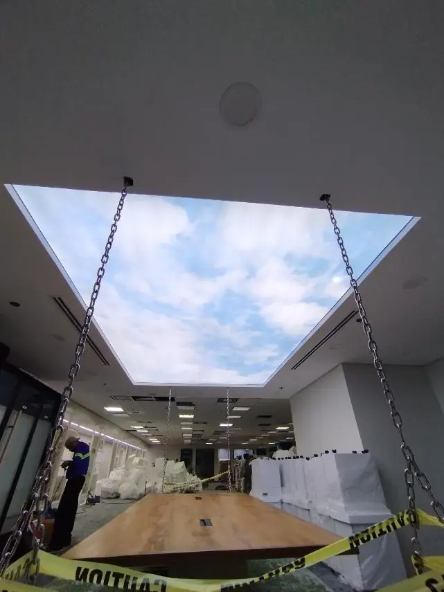 Backlit sky-print fabric ceiling panel