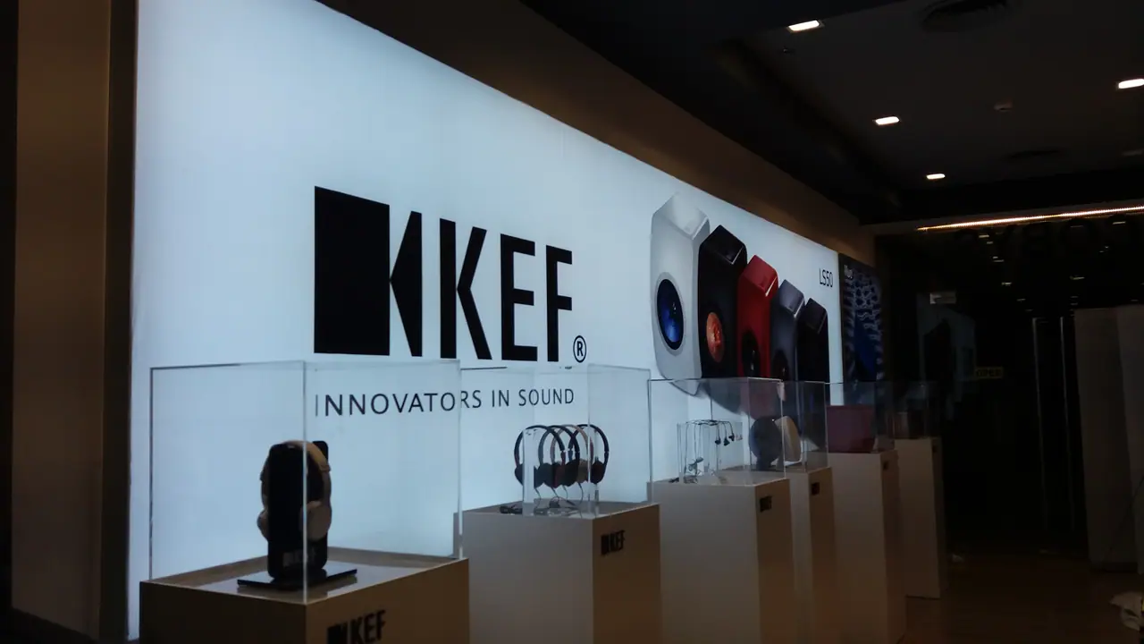 Backlit brand wall in a retail showroom
