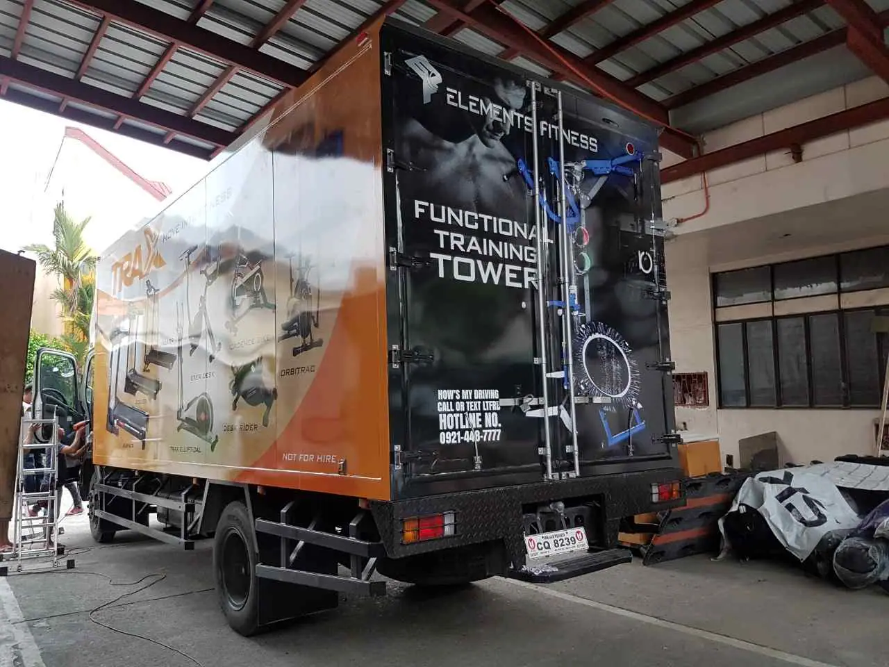 Fitness equipment advertising on a delivery truck