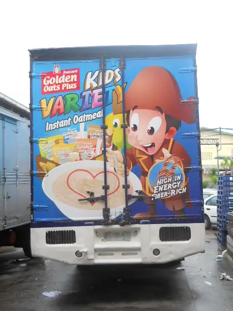Rear door graphics on a cargo truck