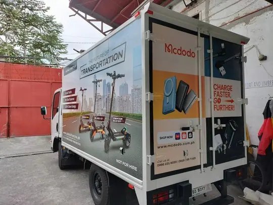 Wrapped delivery truck with product advertising