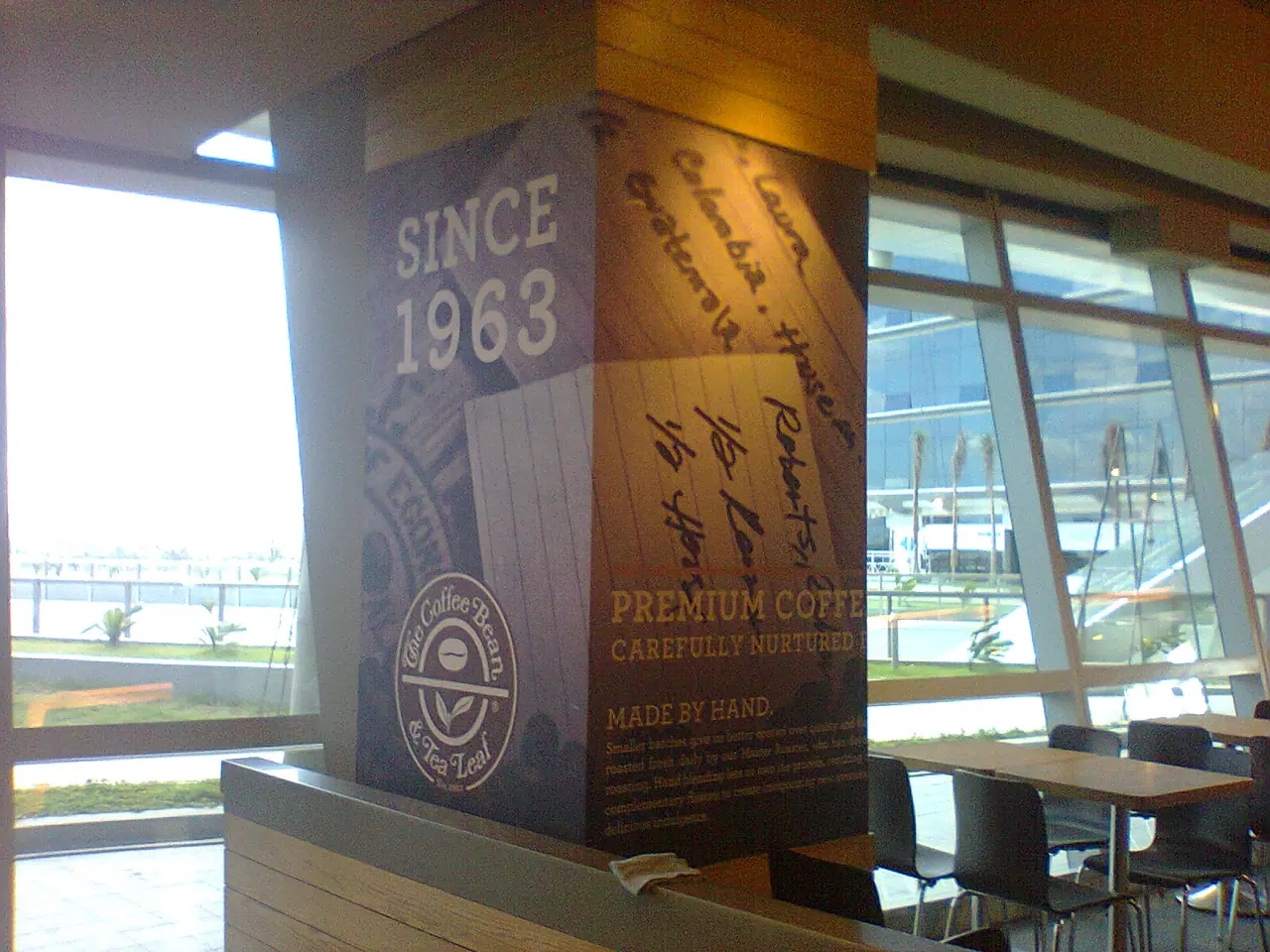 Printed column wrap in a café seating area