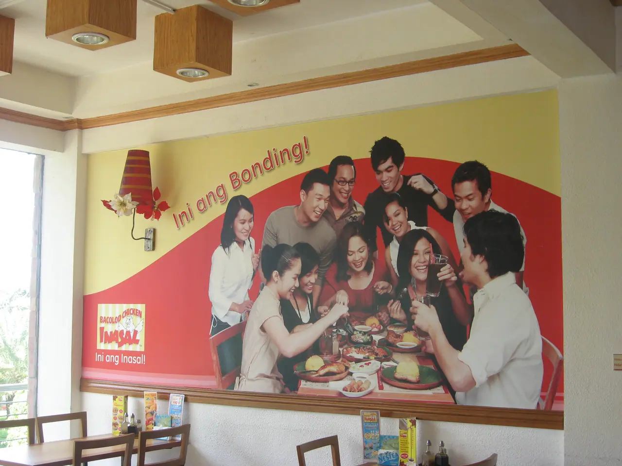 Photo mural of diners on a restaurant wall